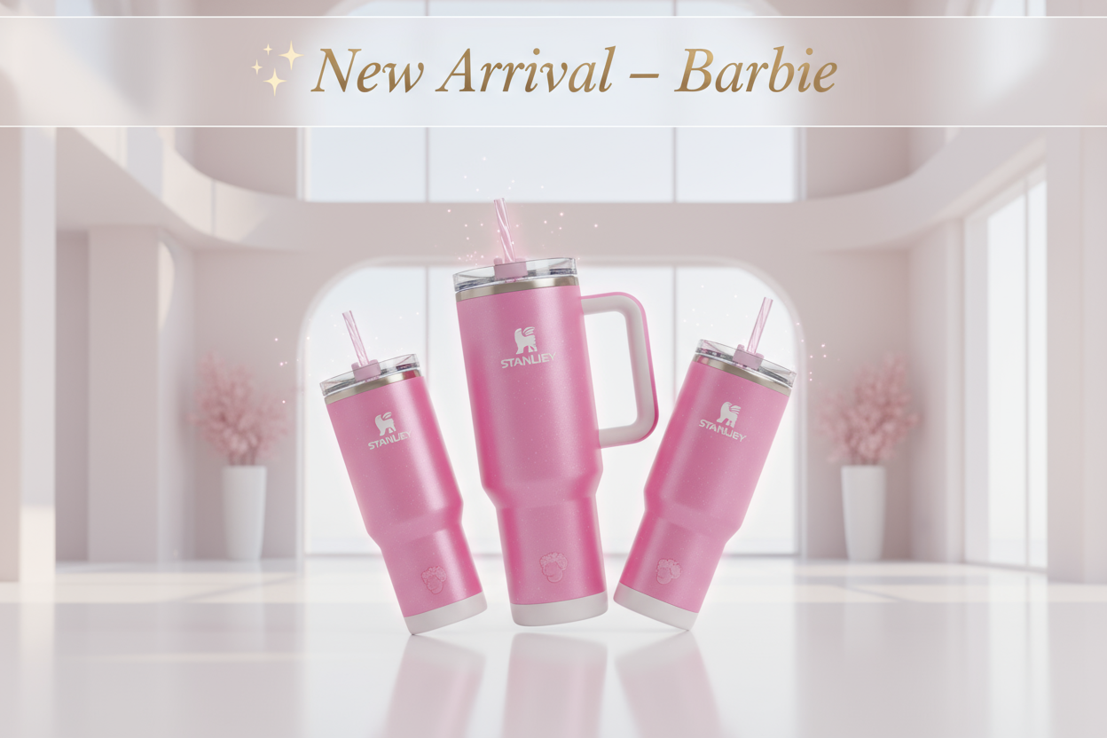 Create a high-resolution Shopify store banner featuring the attached Stanley Barbie-themed tumblers. Keep the original colors and designs exactly the same — do not change the color, shape, or pattern of the tumblers.
The background should be modern, clean, and eye-catching, with a premium lifestyle feel, slightly glowing effects, and subtle reflections to highlight the product quality.
Add soft studio lighting and shadows for a realistic look.
Include elegant text at the top or side:
“✨ New Arrival – Barbie